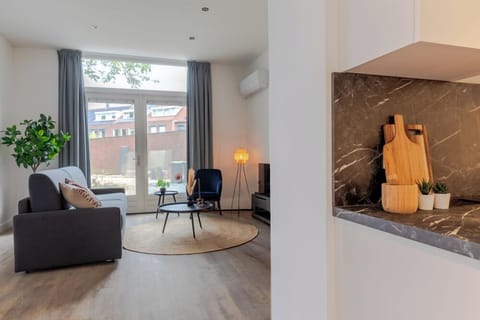 Spacious living room. Stay near the city center, university, Efteling, and Beekse Bergen, with a newly renovated kitchen, bathroom, and a large, comfortable living room