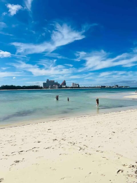 On the beach, sun loungers, beach towels