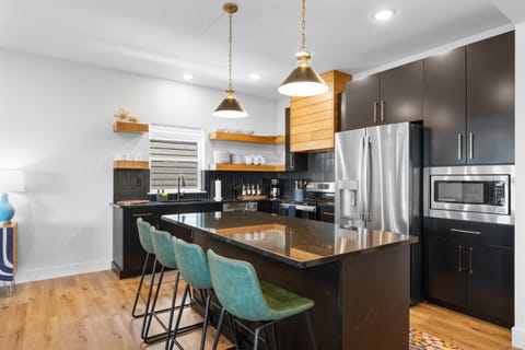 Modern and Fully Stocked Kitchen with Coffee Bar Provided