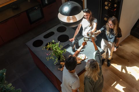 Kitchen equipped with everything you need, functional and spacious with a central island (dishwasher, ovens, microwave, Nespresso coffee machine, filter coffee machine, raclette machines, fondue machines...)