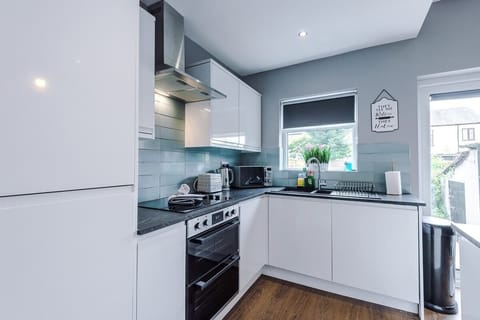 The fully equipped kitchen has everything you need for a long or short stay in Manchester.