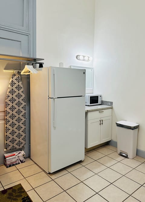 Fridge, microwave, coffee/tea maker, paper towels