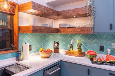 Overbuilt floating shelves with dimmable lighting