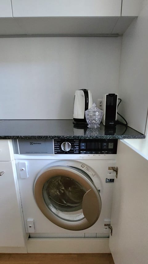Washing machine in the apartment equipped with dryer function for our guests exclusive use.