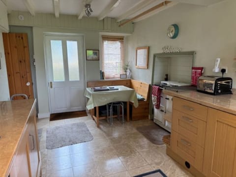 Seating for 4 next to the warm Rayburn