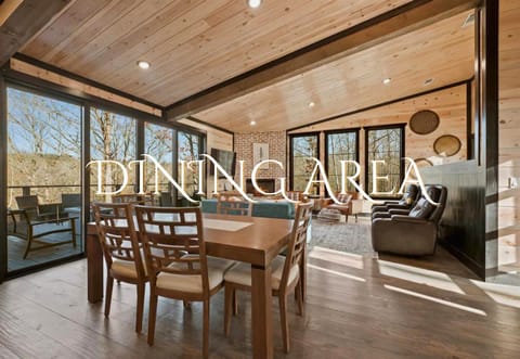 Dine with a view! Our dining area pairs comfort with a panorama, making every meal special.