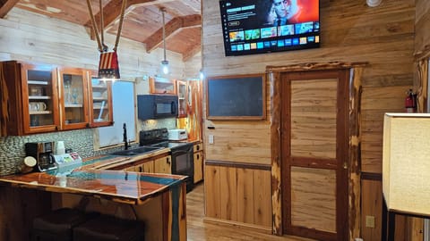 View of 50 inch Vizio smart tv from living room seating area. We have Netflix.