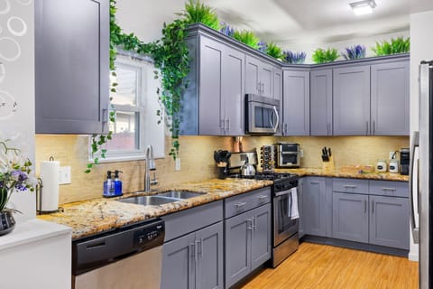 Ample counterspace with serene purple and green flora