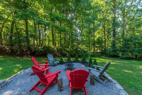Roast s'mores and swap stories around the fire pit in the backyard.