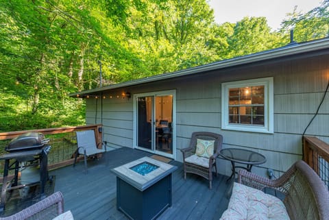 Relax on the deck around the fire table or use the gas grill to make summer favorites like burgers and grilled veggies.