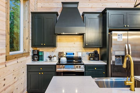 The kitchen is fully equipped with everything you need to make home made meals