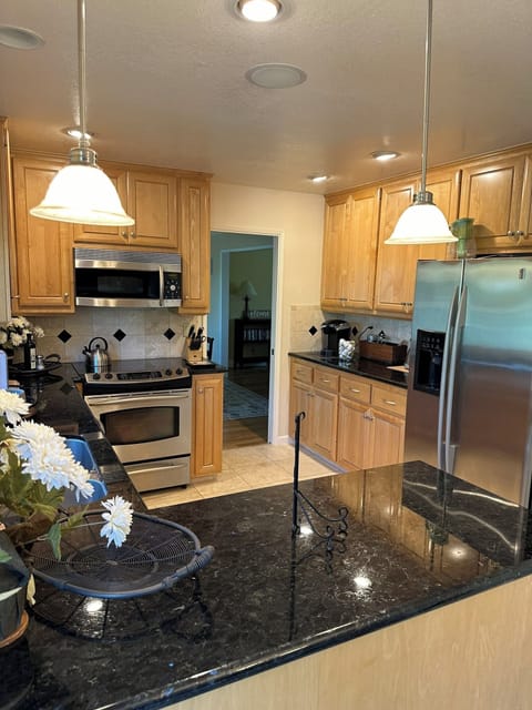 Kitchen - side by side refrigerator and freezer