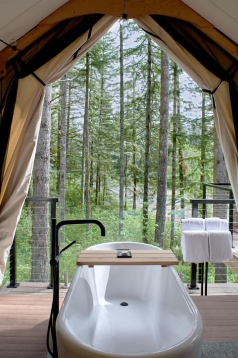 Enjoy a luxurious bath in the heart of nature with this unique outdoor soaking tub.