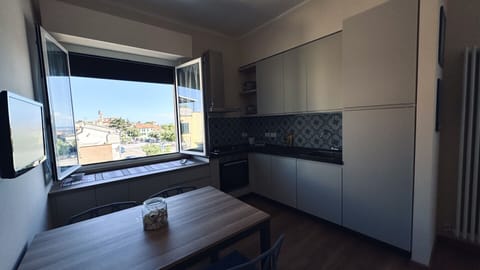 Fridge, oven, dishwasher, dining tables