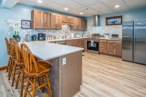 Huge kitchen for home cooked meals and extra dining seating at the peninsula