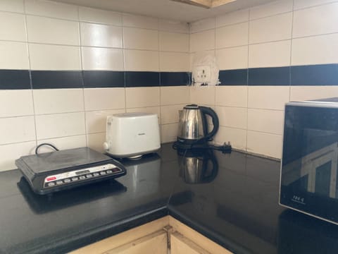 Fridge, microwave, stovetop, electric kettle