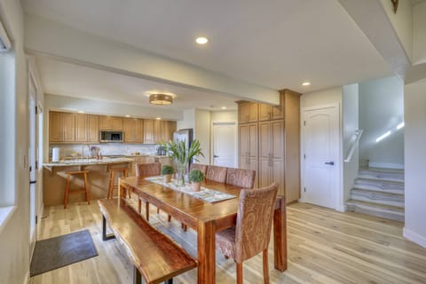 Mealtime is a snap in this fully equipped kitchen and dining space. A Grilling patio and outdoor seating is just steps away.