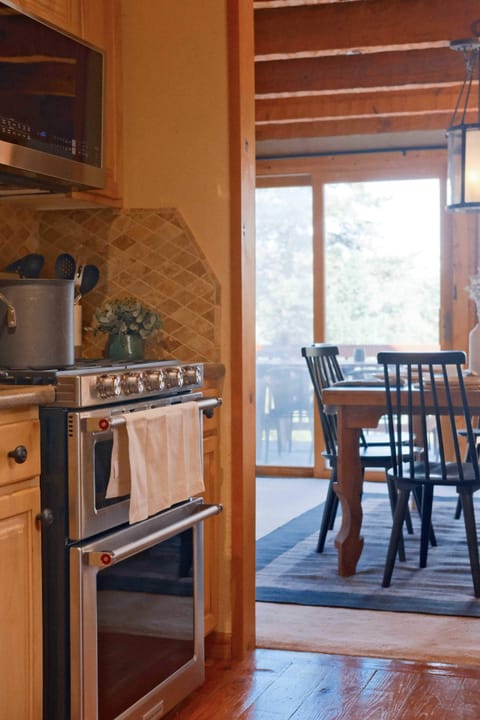 Main Level - Kitchen with Kitchenaid dual fuel (gas range, electric ovens). Double ovens. 5 burners on range.