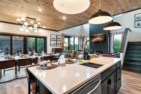 Kitchen island with additional space for serving and seating.