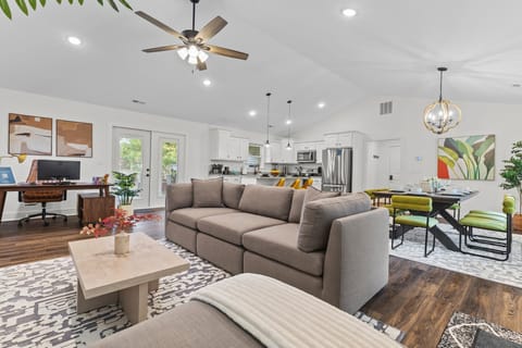 Living Room | lends a warm welcome and flows into the luxurious kitchen