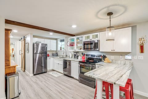 Fridge, stovetop, dishwasher, coffee/tea maker