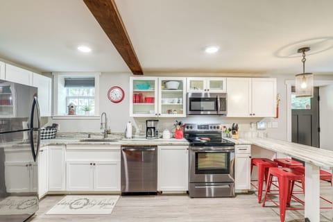 Fridge, stovetop, dishwasher, coffee/tea maker