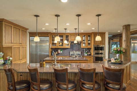 Chefs Kitchen & Island - This central gathering spot is where all the action is! Come see whats cooking, and enjoy the expansive island with bar stools.
