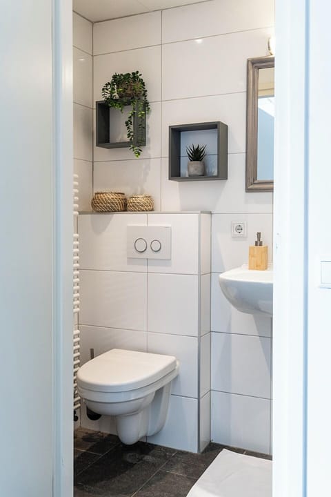 Fresh and well-maintained bathroom.