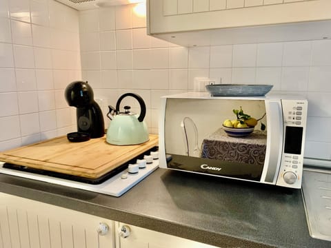 Microwave, stovetop, coffee/tea maker, toaster