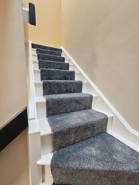 Stairs to level 3, bedroom 5 and 6