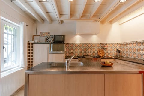 Spacious kitchen in connection to dining area