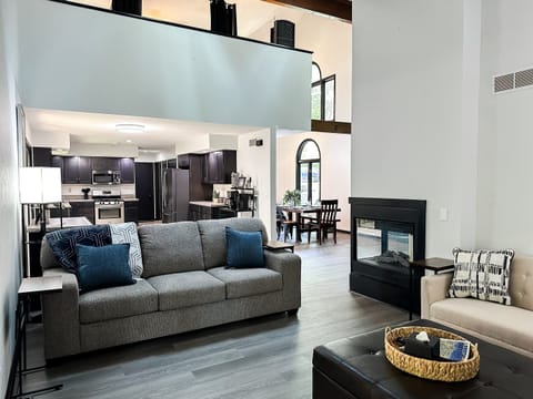 The living room flows into the expansive kitchen, dining room, and due to the open floor plan, it even flows into the upstairs master bedroom!