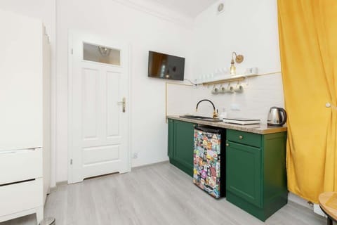 Kitchen area with kettle.