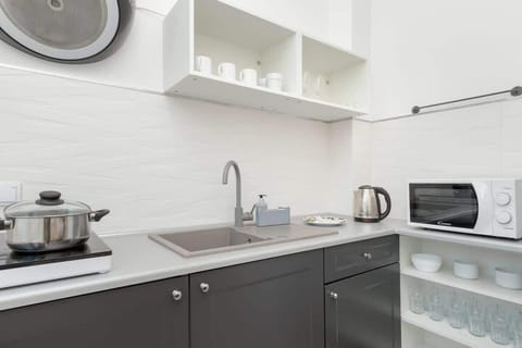 Kitchen with microwave.