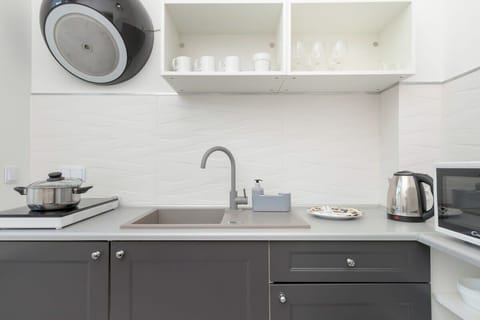 Independent kitchen with dining area.