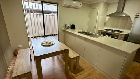 Microwave, dishwasher, dining tables