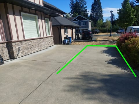 Designated parking spot in the driveway. 