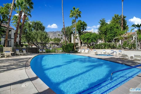 One of four pools with mountain views located steps from the condo.
