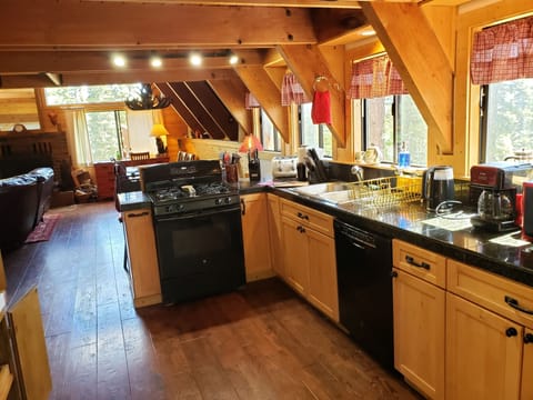 Sizeable kitchen with warm colors.