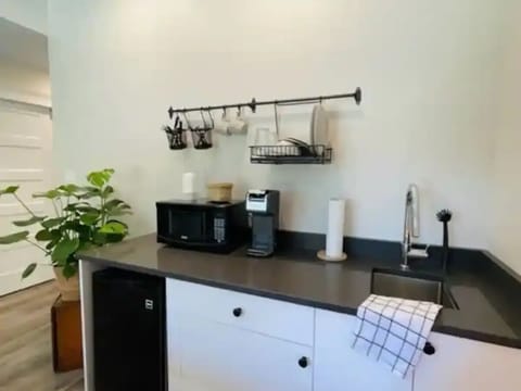 Fridge, microwave, coffee/tea maker, dining tables