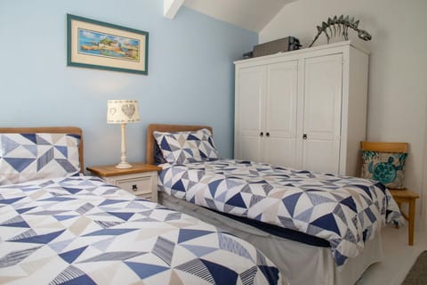 Twin bedroom with wardrobe