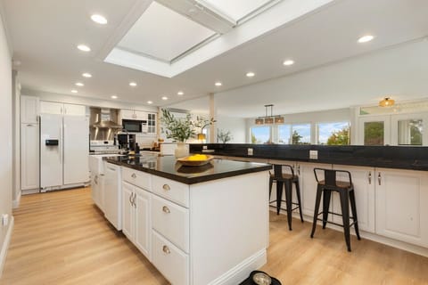 Large kitchen with great storage & views all around