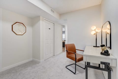 Enhance your stay with a dedicated workspace featuring a comfortable desk and chair, perfect for catching up on emails or planning your next adventure. Plus, with a convenient mirror nearby, you can effortlessly fix yourself up before heading out