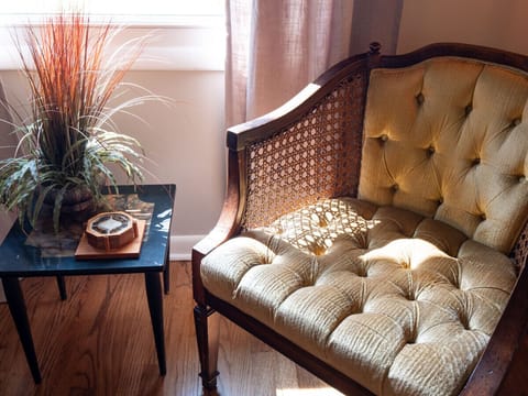 Sink into comfort and let the sunlight transform your space as you lounge in this charming wicker chair, the perfect spot for daydreaming! 🌞 #CozyCorner