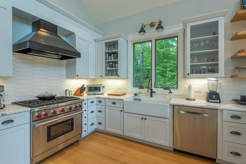 Wolf 6-burner gas range, dishwasher, and standard drip style coffee maker with coffee grinder