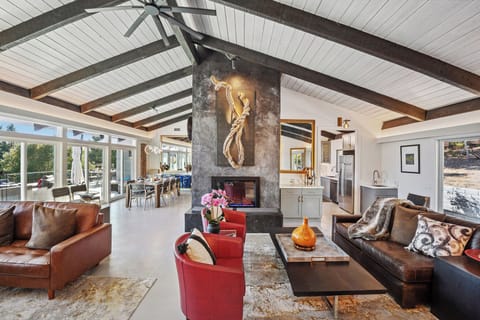 Open-concept great room combing living, entertainment, dining and kitchen together effortlessly