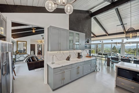 Flow of the kitchen into the dining room, as well as the family sitting area