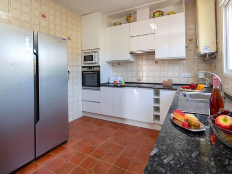 Fridge, microwave, oven, cookware/dishes/utensils