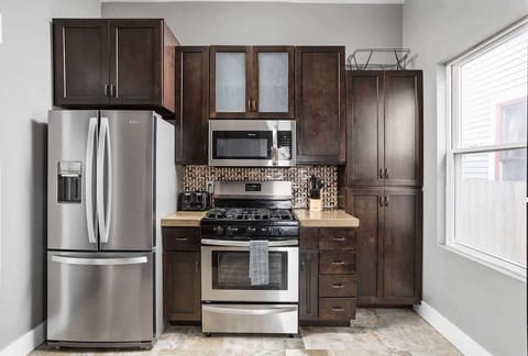 Plenty of cabinet space to bring food for your stay, and a fully equipped kitchen with all of the utensils you'd need to make a home-cooked meal.