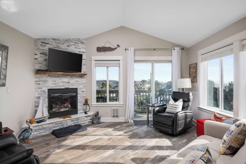 Cozy living room with ocean views and natural light